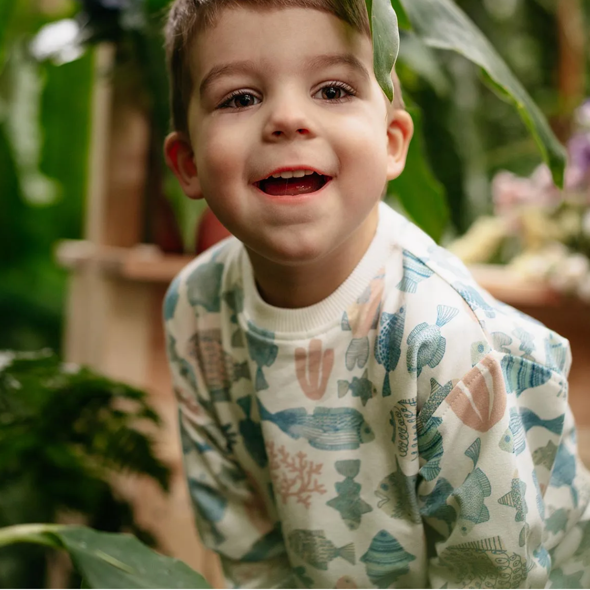 Boy in a blue Moomin t-shirt