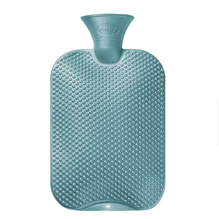 Teal hot water bottle with textured surface on a white background