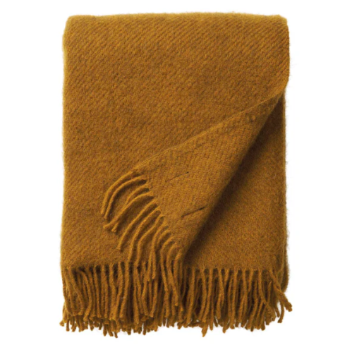 Klippan Gotland blanket on a website with color swatches and product details.