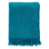 Teal blanket with fringes on a white background, displayed on a website for Klippan.