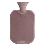 Pink hot water bottle on a light gray background