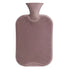 Pink hot water bottle on a light gray background